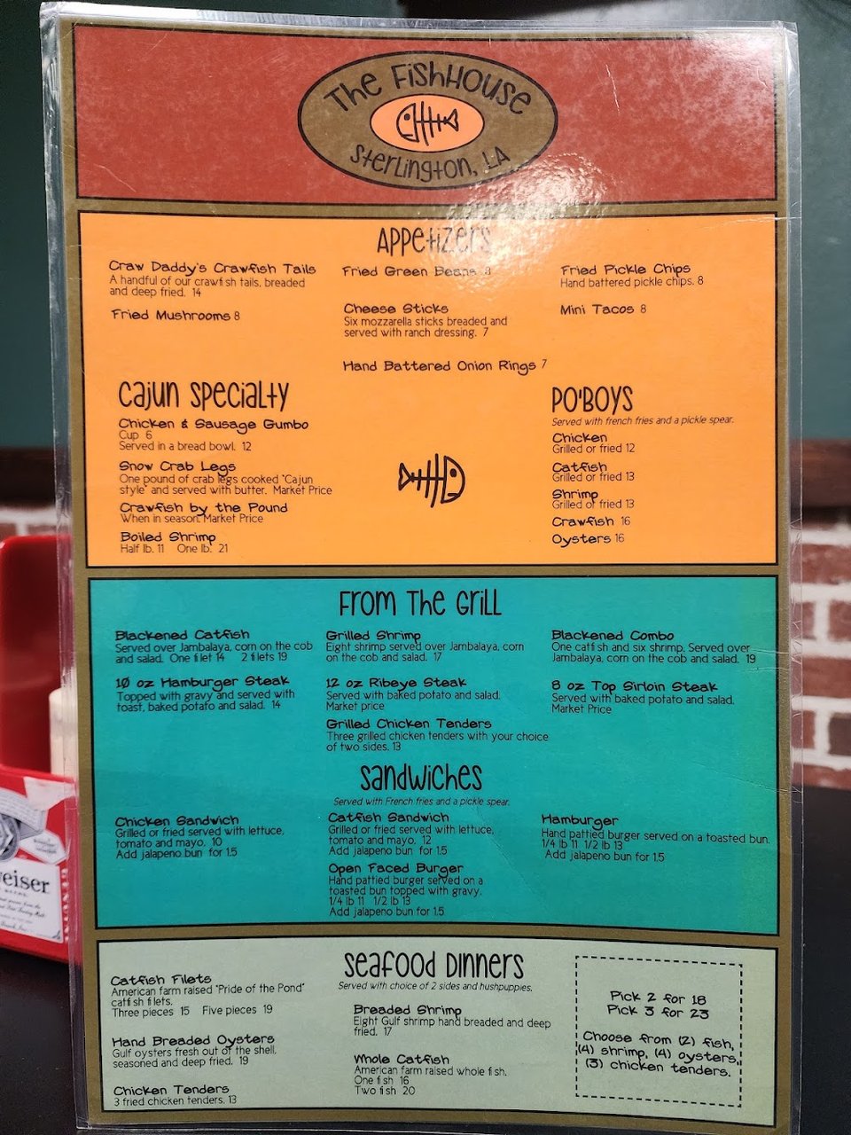 Menu pages showing po'boys and grilled items.