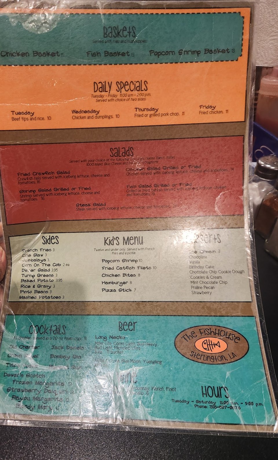Menu listing appetizers and grill selections.